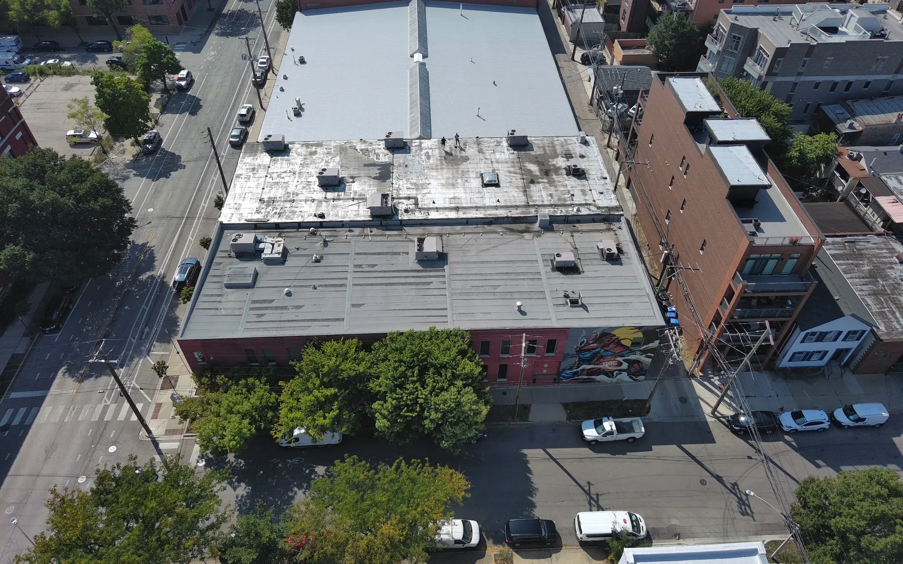 Aerial view of a large flat warehouse roof along the Joliet IL logistics corridor
