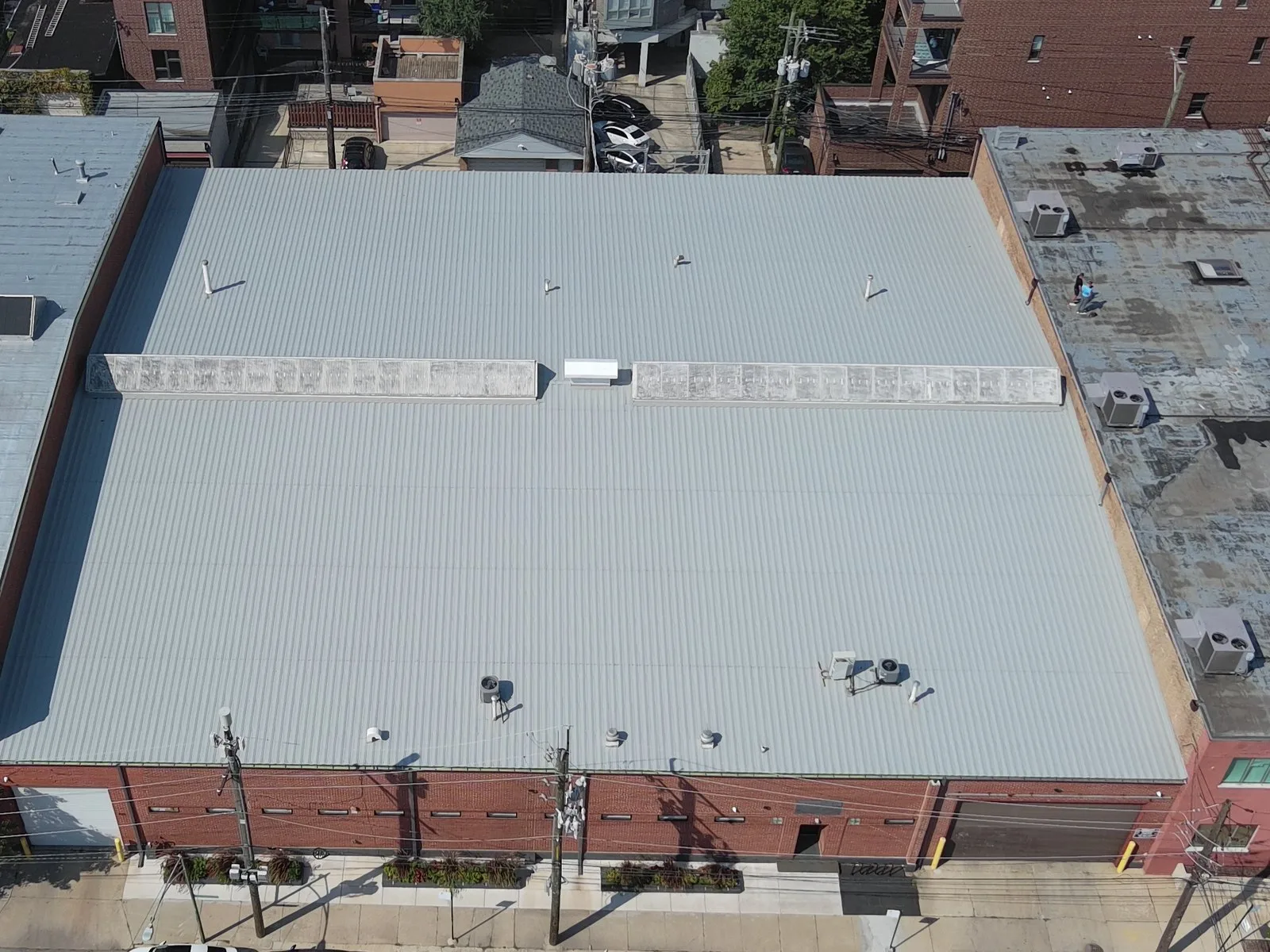 Aerial view of standing seam metal roof on a commercial industrial building