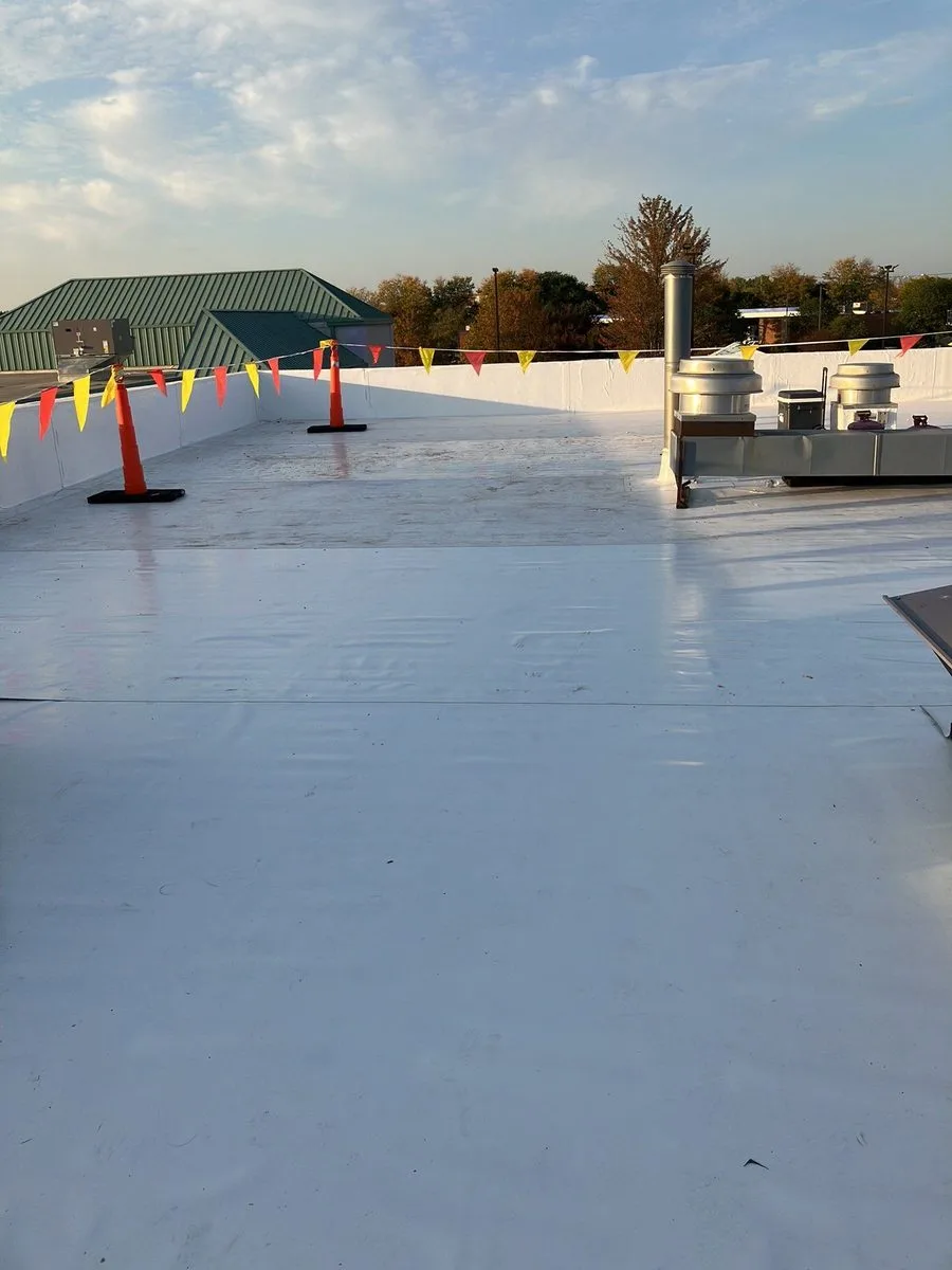 Commercial roofing crew serving Tinley Park IL by Americanstruction