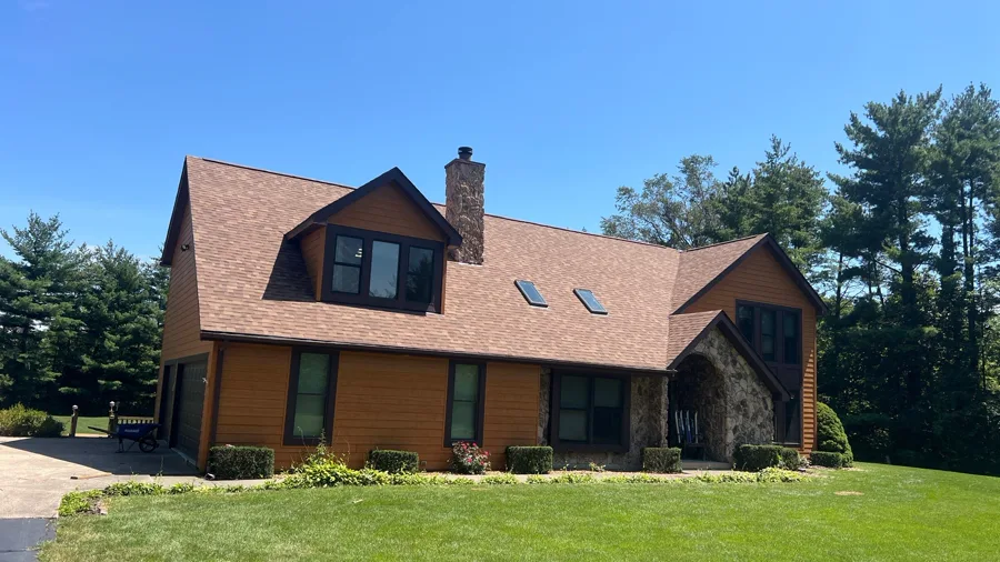 Completed roof, siding, and window project on a New Lenox home