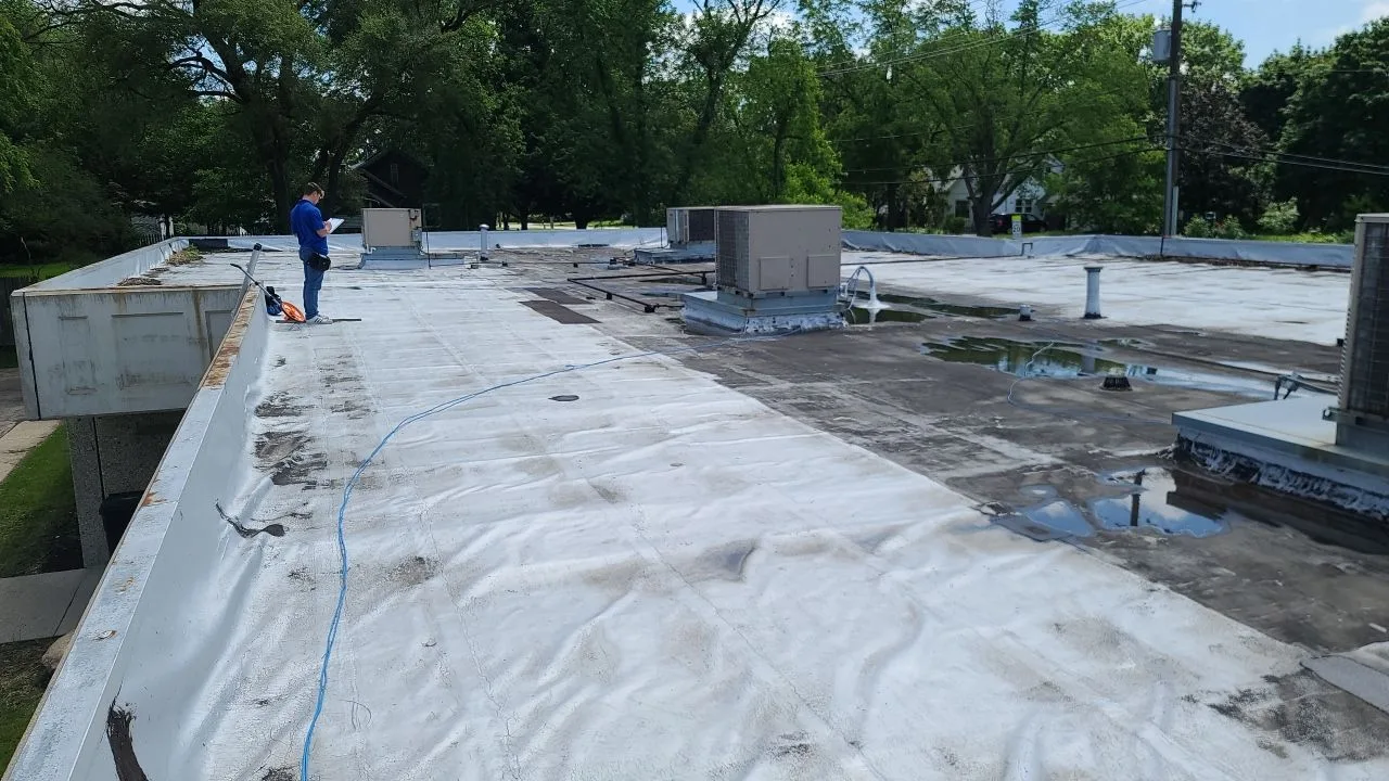 Failing roof on McHenry IL office building before TPO replacement