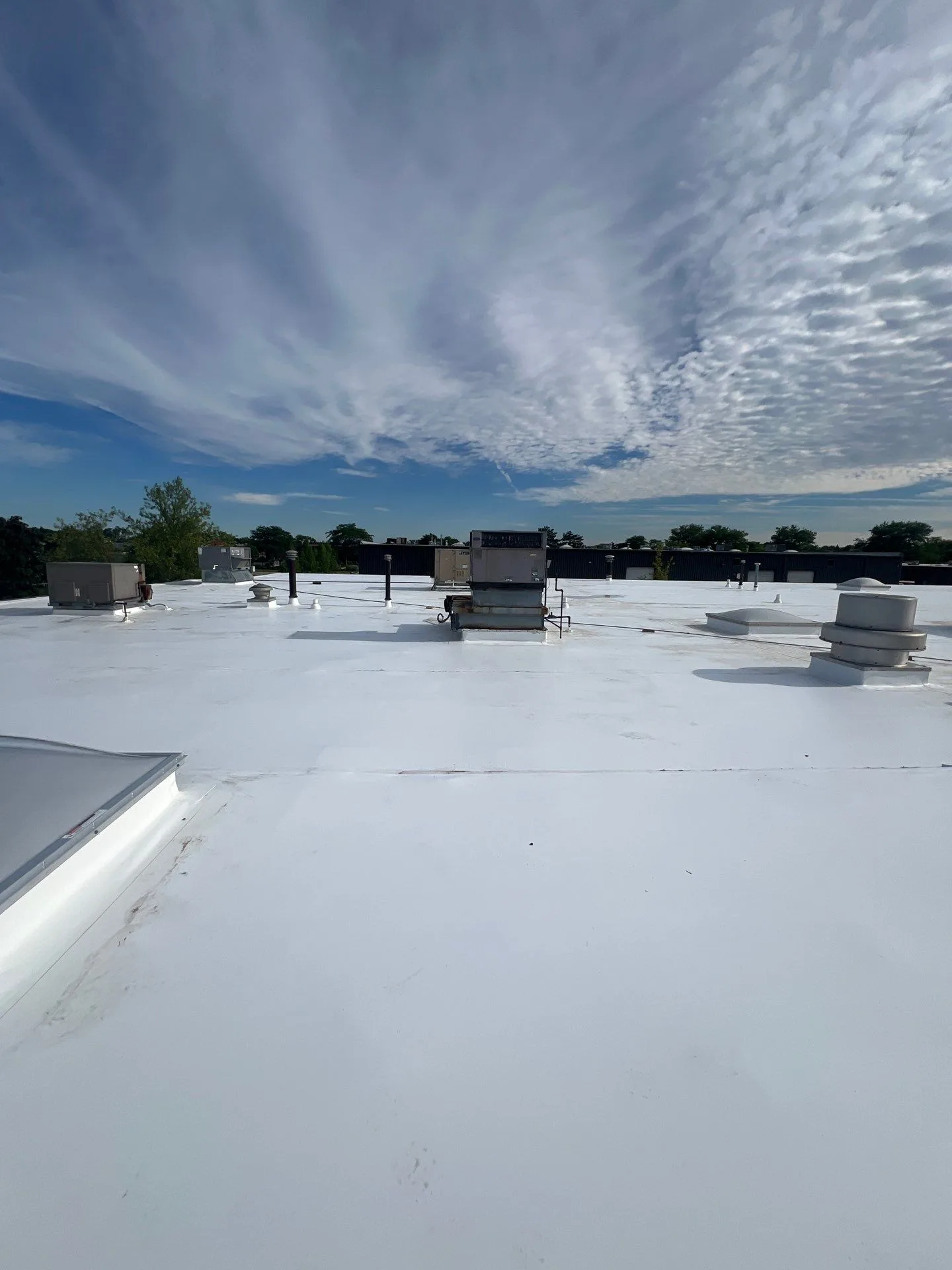 Completed white TPO recover on Northbrook industrial facility