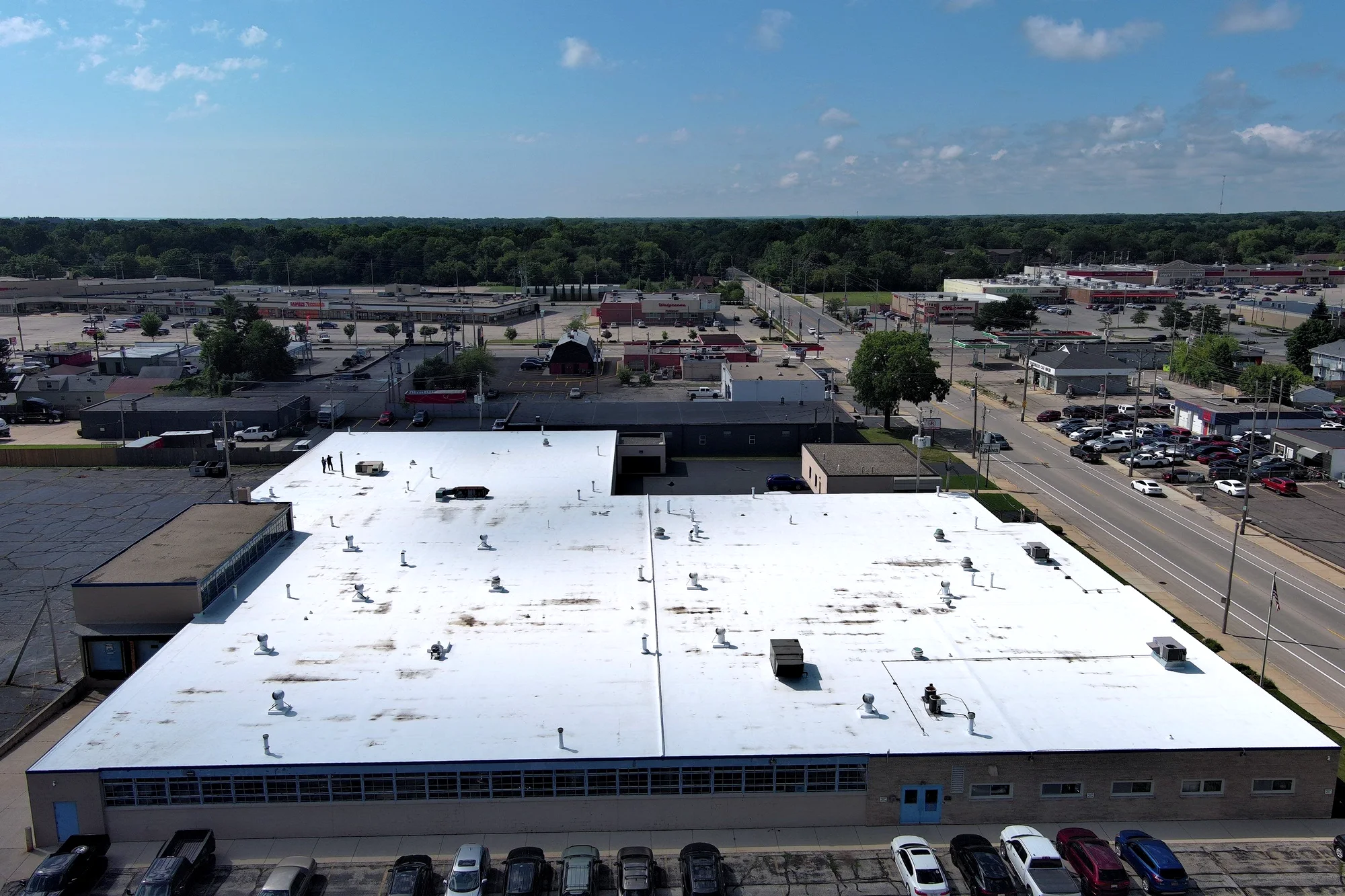 Aerial view of the completed white 60-mil TPO recover on a Racine WI industrial building