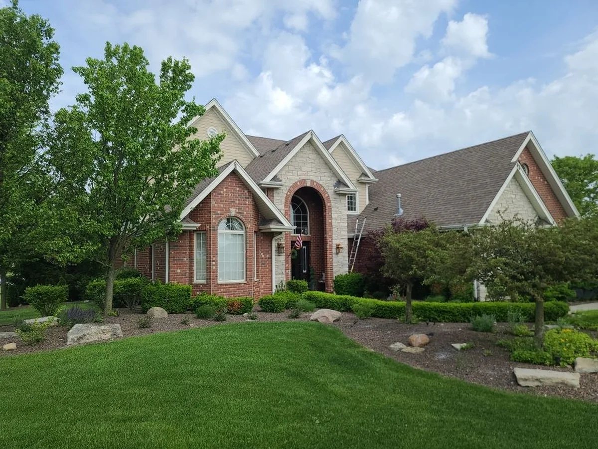 The Golich's Frankfort brick home before its roof replacement