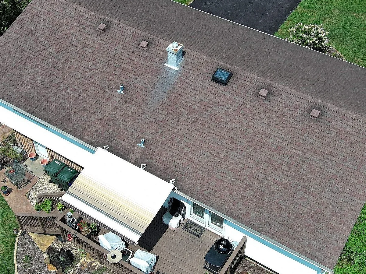 Aged asphalt shingle roof on the Kummer's Mokena home before replacement