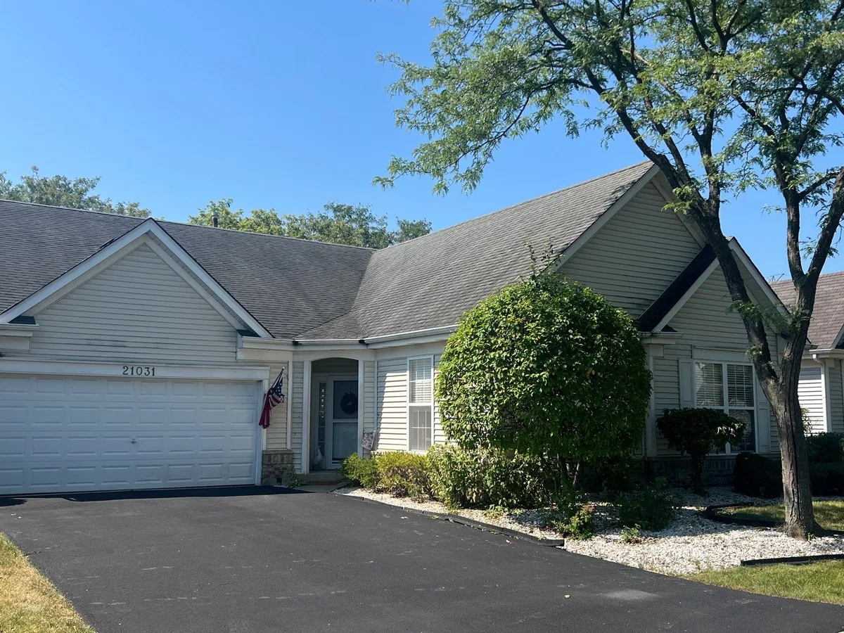 The Widder's Plainfield home before its roof and exterior project