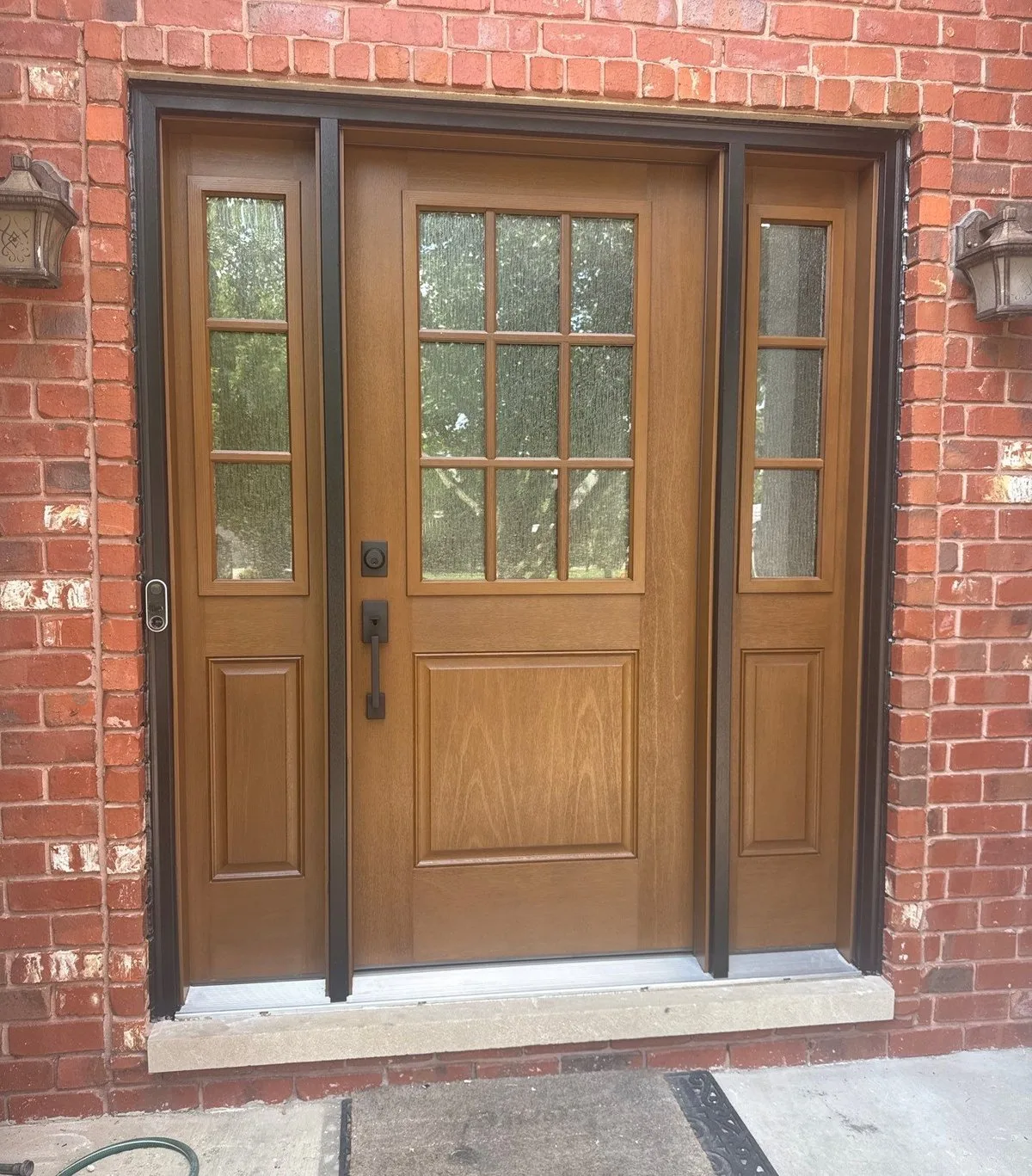 Entry door of the type a storm door protects, installed by Americanstruction