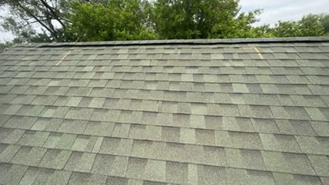 Aging architectural shingle roof on a La Grange home, inspected by Americanstruction