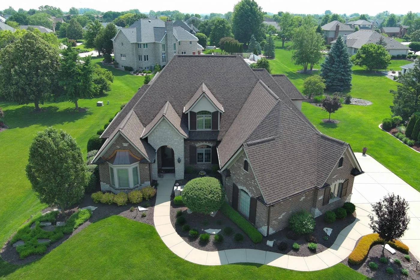 Luxury Chicago suburban estate home with DaVinci composite designer roof