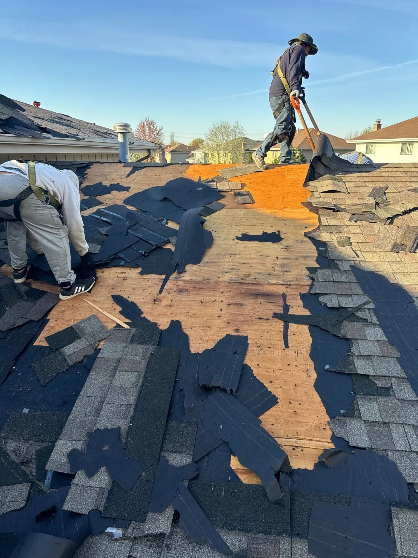 Tear-off crew working on Romeoville home